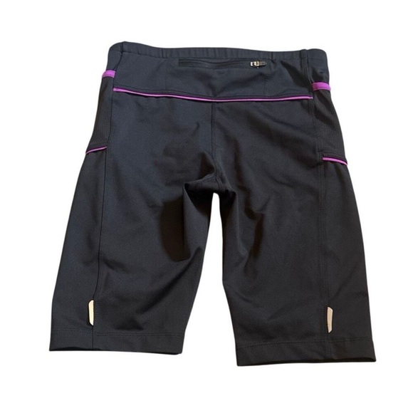 Athleta 10” Women’s Black Bike Shorts with Purple Trim - Picture 2 of 4